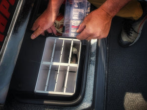 Keep those expensive swimbaits protected while in your boat, kayak, or shore! Perfect for the larger swimbaits and glide baits and will also accommodate the flutter spoons Handle on top for ease of getting in and out of the storage compartments and also perfect for attaching to backpack or kayak Mesh on the bottom to allow for air flow and drainage Separate compartments to hang baits with individual rods and clips.