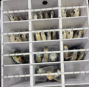 Two sizes available and redesigned interior! The Ultimate Swimbait Tackle Storage! Keep those expensive baits protected! Separate compartments to hang swim baits with individual rods and clips. Front pockets for tools and zippered side pockets for storage.