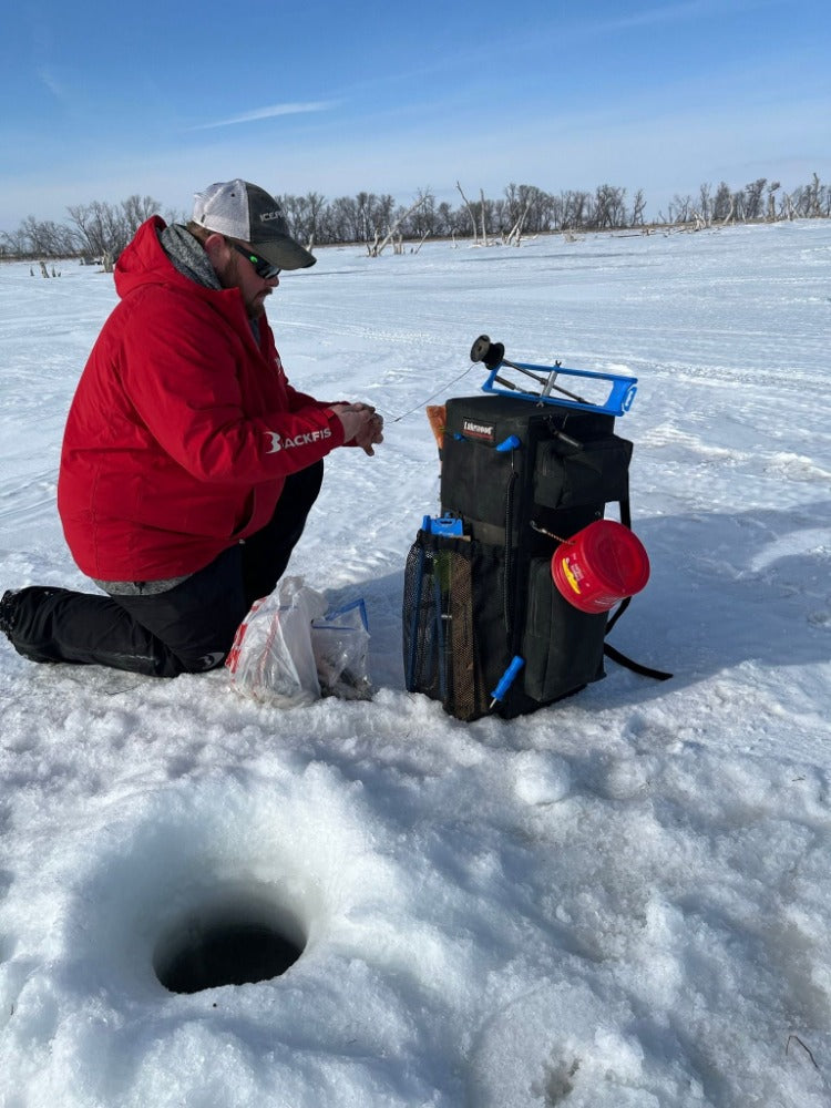 The Ice Pak from Lakewood Products accepts the largest tip-ups and is perfect for Ice Fishing. Gear pockets for tools also act as a third hand for restringing. Holds up to 5 rods on side of case. Can be used as a backpack. Made in the USA. Lifetime Warranty.